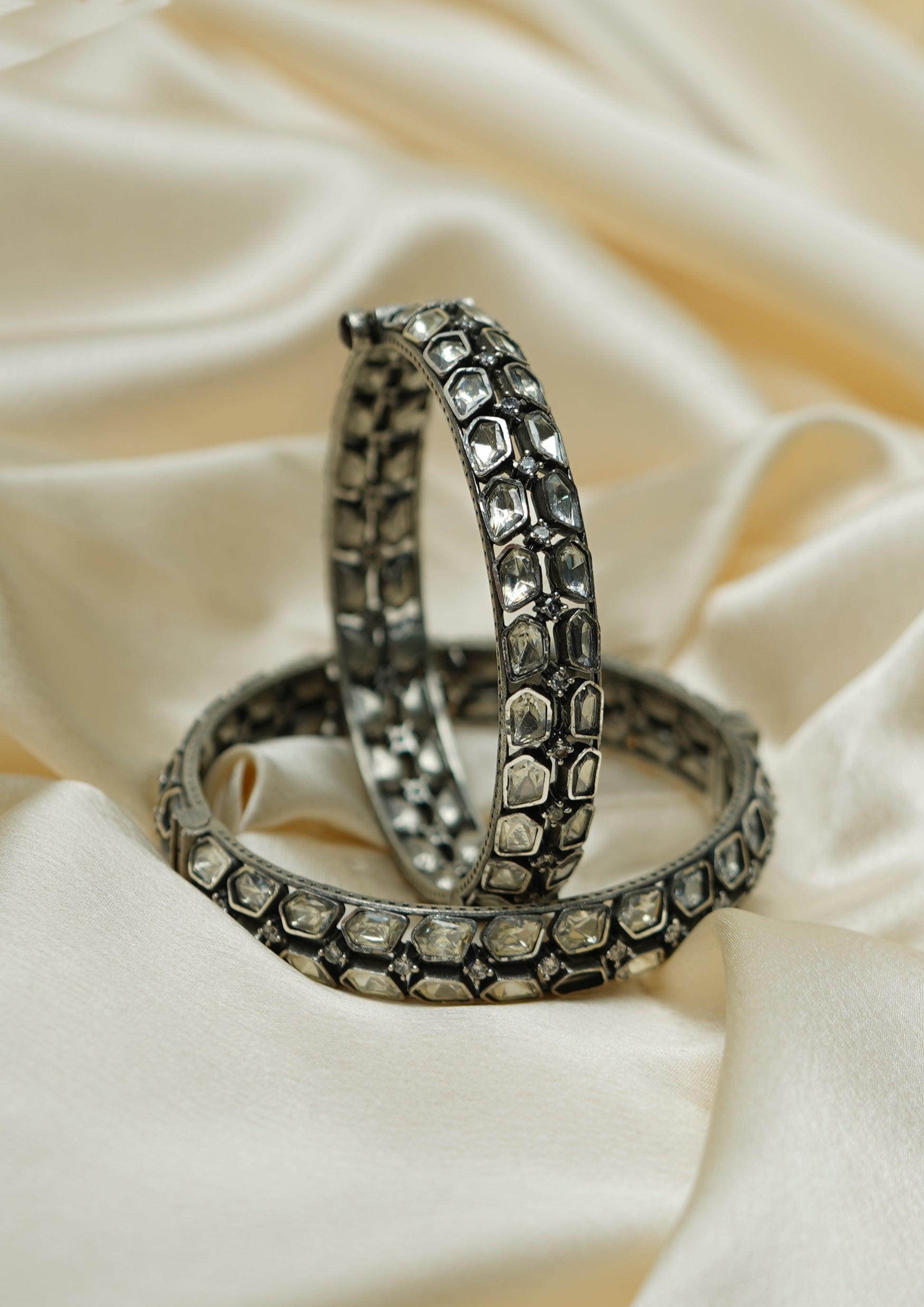Amrita Nupura Polki Oxidized Silver Finish Bangle Pair