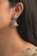 Rasa Ranjika Nakashi Oxidized Silver Finish Jhumki